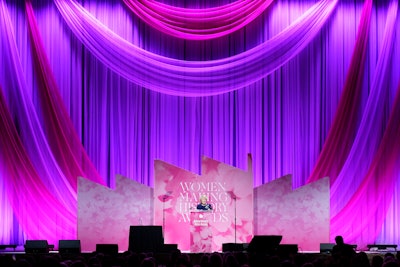 This year’s event—which featured an eye-catching pink floral stage offset by dramatic pink draping—was hosted by award-winning CBS News journalist Norah O’Donnell. It honored inventor, entrepreneur, and philanthropist Sara Blakely; Dr. Opal Lee, the “Grandmother of Juneteenth”; and advocate for transformative research and education Shirley Ryan. Mattel Inc., celebrating its 80th anniversary this year, received the inaugural Evelyn Y. Davis Women Making History Corporate Changemaker Award.