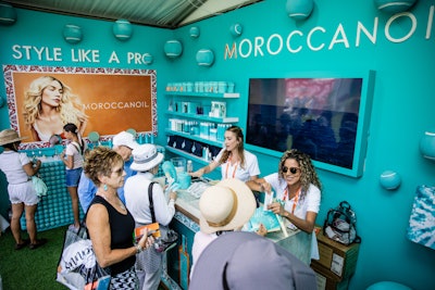 Moroccanoil’s pop-up booth, dressed in its signature aquamarine hue, featured a “Style Like a Pro” campaign. Brand ambassadors handed out shampoo and conditioner samples.