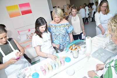 Stewart supervised the projects during the event, teaching guests how to use her new home-decor stencils and mylar stencils to create customized fabric pouches.