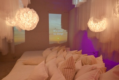 “The idea was to have these really distinct moments through the space,' explained Anderson, who noted that the brand played with elements of scent, sound, and visuals to bring the concepts to life. “For the ‘comfort’ space, for example, we showcased a lot of textiles, our new mattress line, and some of our new comforters.” The dreamy space also showcases IKEA's lighting solutions, and the importance of setting the right mood lighting as you're falling asleep and waking up.