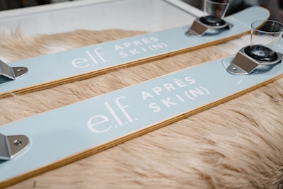 Upon arrival, guests were greeted by brand ambassadors clad in ski gear and given a custom-branded ski lift ticket before hitting the “slopes”—aka the three product stations. After visiting and receiving a ski lift ticket stamp from all three pedestals, guests could redeem their ticket for a gift bag containing full-size products from each collection. In LA, the team also served green juice at a shotski station. See more: Peak Pampering: How e.l.f. Created a Snowy Sanctuary for Skincare