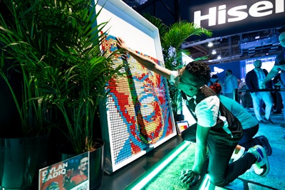 Dylan Sadiq—known as The College Cuber for his unique Rubik's Cube art—created six different art pieces live during the event. Other engaging moments included tricks and performances by a Harlem Globetrotter, and a special appearance from FIFA legend and former goalie Júlio César. Hisense also showcased its latest products, including laser TVs, gaming systems, and appliances, with experts presenting the key highlights of each division through live product demos onstage throughout the week.