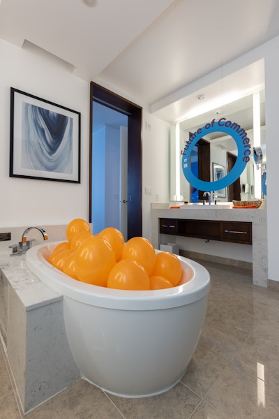 It was no secret that the suite was Criteo’s, as each decor element and touchpoint reflected the advertising company’s brand color—orange—and messaging.