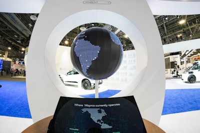 Real progress and real results could be experienced through key touchpoints like an interactive central table that allowed guests to explore the Waymo ecosystem with animated projections, displaying its connection to various community stakeholders. There was also an LED sphere (pictured) that highlighted Waymo’s current and future markets and let guests suggest new locations for global expansion.