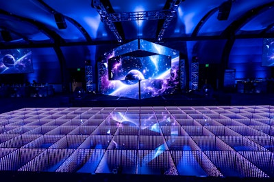 The 2024 Atlanta Pride Official Kickoff Party, held at the Georgia Aquarium on Oct. 10, had an “Intergalactic Futuristic Disco” theme. Designed by YES Event Designs, the gathering blended retro vibes with futuristic technology and interstellar aesthetics. A custom-built LED DJ booth was in the shape of a spaceship and featured ever-changing cosmic videos; the venue was also adorned with holographic projections of swirling galaxies, nebulae, and twinkling stars. The dance floor, meanwhile, was a glowing, interactive LED surface that responded to the rhythm of the music, creating a kaleidoscope of colors that pulsed and shifted with the beat. Active Productions handled the event's AV.