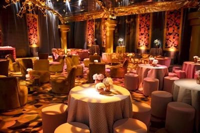 Butchkavitz worked with Special Event Contractors to cover the pool, build perimeter walls that defined the event space, and create custom staging and bars. Agile Eye Solutions handled the large-scale decor elements, artwork, press walls, and drapery, and custom tenting came from SoCal Tents. Projection designer Bart Kresa blanketed the outdoor space with custom animated projections, which were complemented by lighting from Images by Lighting.