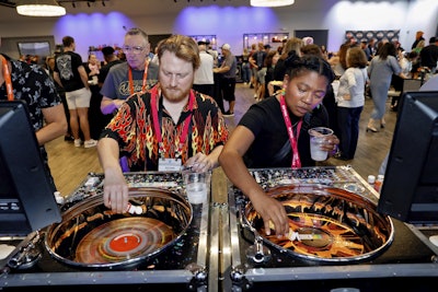 9. Record spinning art at the opening reception
