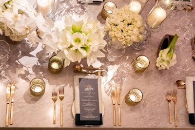Studio D Decor collaborated on the event’s design, props, and other decor elements. Additional vendors included flowers from Mark’s Garden, fabric from SS Scenic, and additional props and specialty rentals from Theoni, Revelry Event Designers, and Mr. Foam & Scenic. La Tavola Fine Linen Rental provided linens for napkins, and rentals came from Bright Event Rentals.
