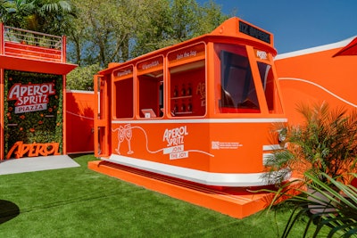 Meanwhile, Aperol Spritz made its first-ever Coachella appearance with the Aperol Spritz Piazza, which opted for an eye-catching orange color scheme. The cheery, photo-friendly space was filled with vibrant flowers and oranges. Swell handled the design, production, and execution of the space, which was intended to be a modern and joyful take on an Italian town piazza.