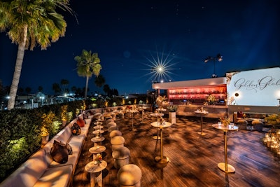 'Our rooftop featured the venue's natural rose quartz bar, flanked by a fluted oak DJ booth (set into a magnolia branch garden), a custom-wrapped gelato station, Funke's famous pizza oven, and long banquettes filled with overstuffed pillows and tonal throws to counter the chilly night breeze,' said Mazzuca, whose team also worked with Bright Event Rentals and Jimmy's Permit Service on additional production logistics and Chuck's Parking on parking services.