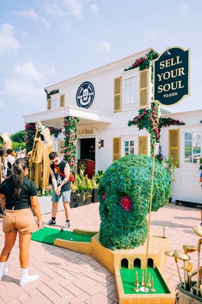Mini-golf, just outside the entrance, was new to the activation. Anyone who got a hole-in-one could get faster entry to the mock country club.