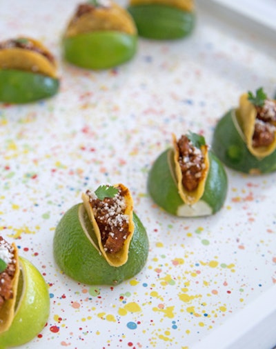 Sonnier and Castle created a menu of bite-size chicken tacos with cilantro and mole (pictured), vietnamese summer rolls with sweet chili sauce, chilled lobster salad with lemon and dill, and a raclette gouger with parmigiano-reggiano. For dessert, chocolate brownie bites and a shortbread wafer topped with coins of lemon and baked meringue were served.