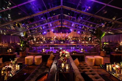 Further into the space was a tiered ballroom, which featured a dance floor and entertainment by DJ Benjamin Walker (and later, actress and comedian Tiffany Haddish). Later in the evening Shake Shack provided late-night bites and Milk Bar provided an ice cream sundae bar and other desserts. There was also a photo booth from The Bosco, and Butterfly Floral & Event Design handled flowers. High-profile party attendees included Laura Dern, Olivia Coleman, Martin Scorsese, and Leonardo DiCaprio.