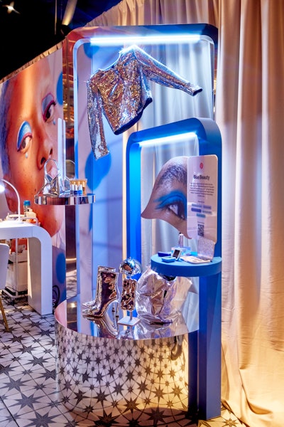 Displays around the activation showcased various Pinterest Predicts trends like 'Be Jelly' (an ode to the squishy aesthetic found in shoes and handbags) and the ones pictured here, 'Blue Beauty' (all about blue glam makeup) and 'Hot Metals' (cool silver tones and bold chrome). 'All of the products here are from Pinterest merchants,' Doyle said. 'We created an online store for all of the trends, so people can scan the QR code and shop right on Pinterest.'