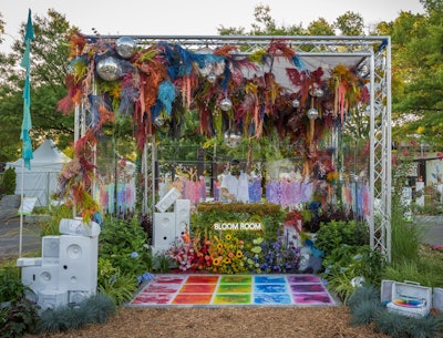 Jennifer Reed has been creating floral designs for events for over 20 years at her company, Jennifer Designs. She creates pieces that emphasize sculptural composition, invoking feeling through color.