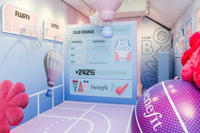 A Club Bounce Community Board featured scoreboards, one-of-a-kind merchandise, and polaroids of makeup-loving visitors.