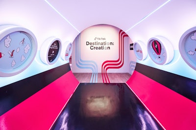 Upon entry, creators received a TikTok-branded 'passport' and stepped through a tunnel reminiscent of an airliner, lined with windows that offered fun TikTok Easter eggs related to trends and destinations.