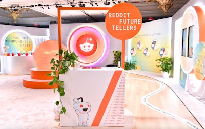In another area, “The Communi-Tea Bar” (seen back left corner) invited guests to “read the communi-tea leaves” and further interact with futurism on Reddit’s platform. Tea bags were individually wrapped based on their subreddit, and featured future-telling posts (like “I think the 2032 presidential election is the first ‘gas prices don’t matter’ election” from the r/electricvehicles subreddit). After your tea was brewed, a QR code was revealed at the end of the tea bag’s string, which led to the actual subreddit thread on the platform. And in another interactive moment, a quiz asked visitors true and false questions about what they think Redditors are future-telling about. For example, “grasshoppers are the new kale,” which was true.