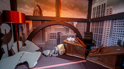 The Prime Video booth's final room brought guests into an animated world, depicting the corner office of Titan from Invincible. As the big finale of the experience, attendees climbed up a stairwell in the office building to the second-floor roof, opened the roof door overlooking all of VidCon, and were able to take a leap into the foam pit below. The booth was produced, designed, and executed by Mirrored Media with support from Catalina Productions.