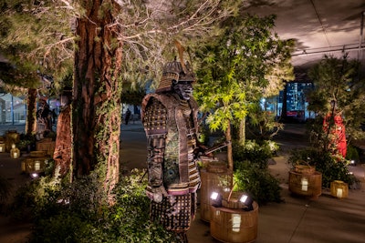 Guests traveled through the lush forest, where they encountered original costumes from the show. The series' score was playing through hidden speakers to further the immersive feel. The space 'allowed for great photo ops and a tease of what was to come,' said Schubert.