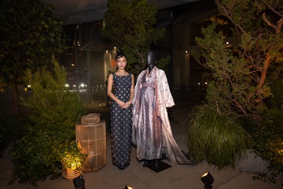 'The entry moment felt particularly special,' added Van Goethen. 'It was something out of the ordinary, and truly a first stop in immersing all guests into this visually rich world—between the costumes, the fog, and the music, it was a really inspiring moment.'