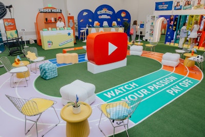 The YouTube Creator Stadium, meanwhile, was designed to educate and inspire rising stars, focusing on providing memorable moments for first-time VidCon attendees and newer creators. Using a running track as the focal point, guests were transported to a lounge featuring a stadium-inspired photo op; an interactive 'Game Day Challenge Zone' to test attendee skills on iconic YouTube trends like Flip Cup; and a YouTube locker room shopping experience featuring products from VanossGaming, Brooklyn and Bailey, Brittany Rose, The Fitness Marshall, and By Chloe Wen.